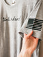 Unburdened w/flag sleeve