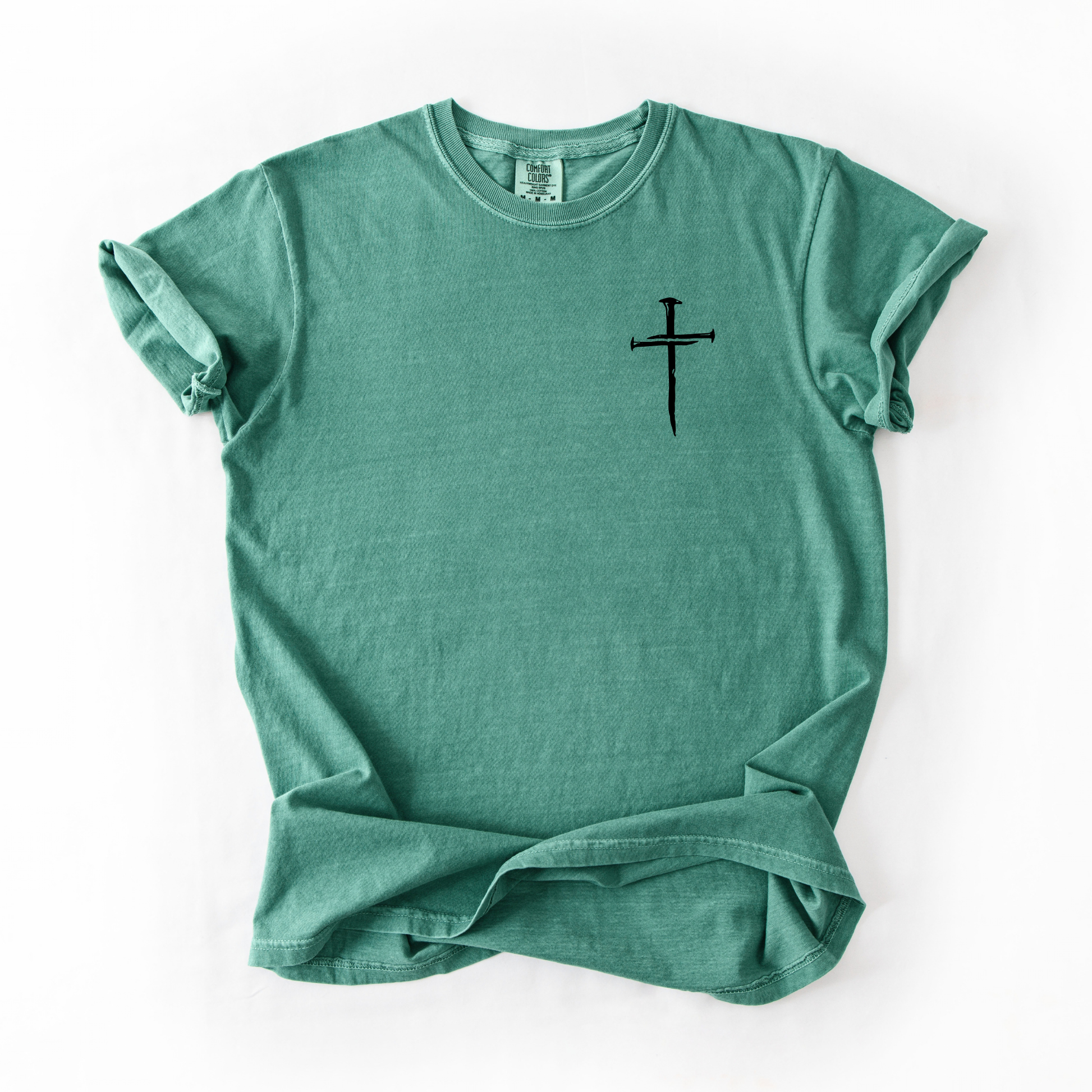 Three Nail Cross Christian Graphic Tee in seafoam green featuring minimalist cross design from Birkland Boutique Christian Boutique