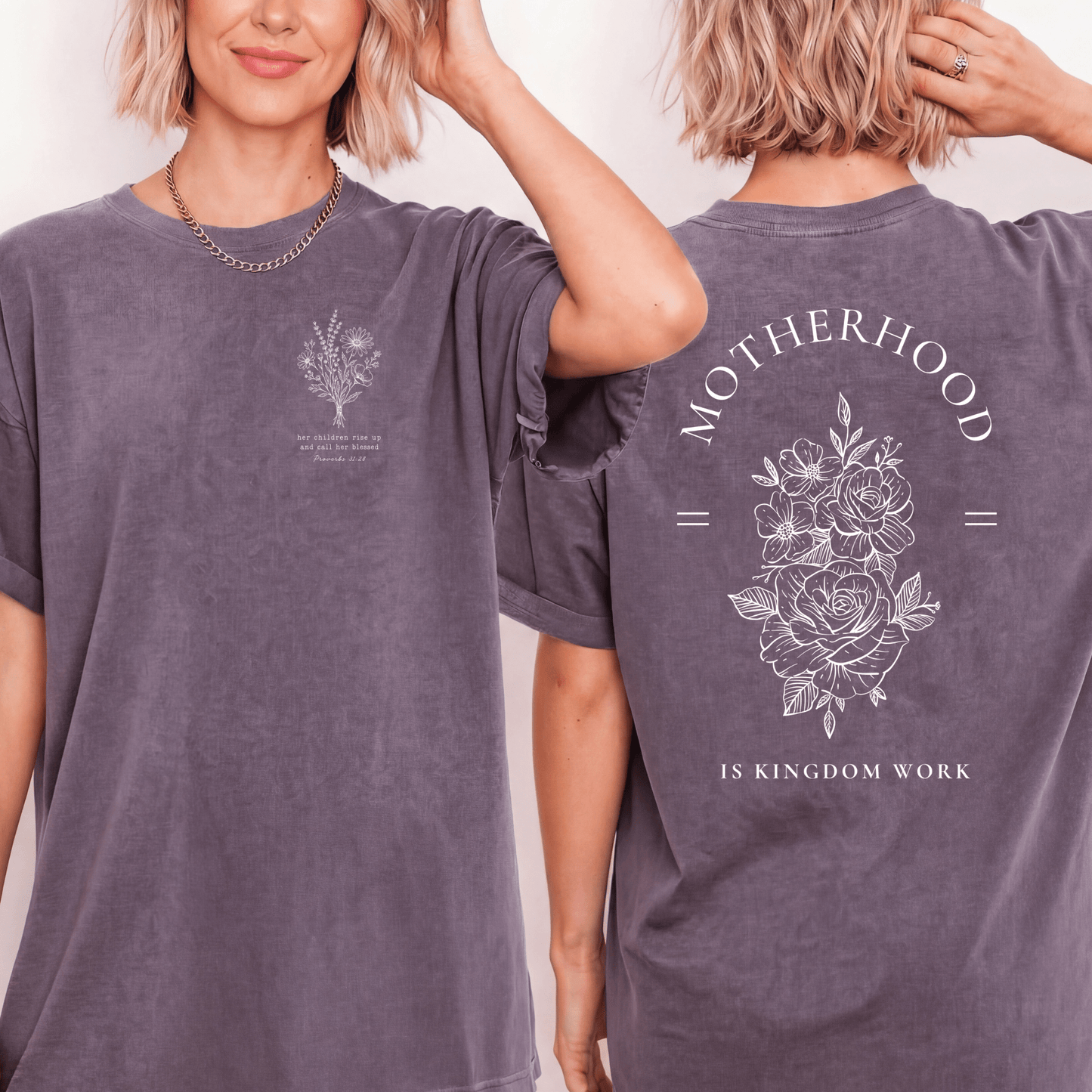 Woman wearing a Motherhood Is Kingdom Work Christian graphic tee with Proverbs 31:28 floral design unisex t-shirt.